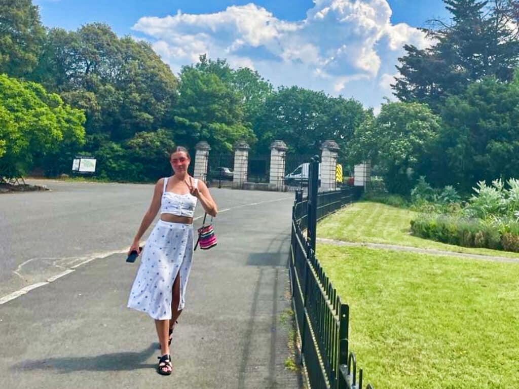 The author Brooke Horrobin, walking around Dulwich Park on a sunny day