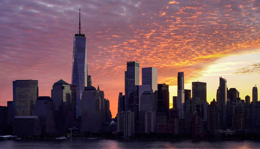 View of a skyline from Brooklyn Heights Promenade during sunset