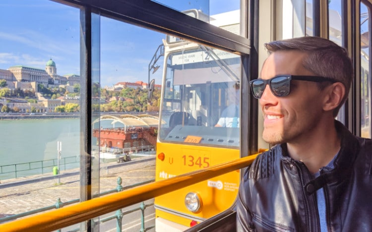 The author Nate Hake looking out the window of Tram Number 2