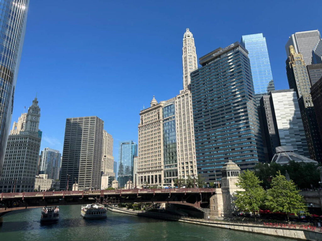 Clear blue sky over the buildings and Chicago River