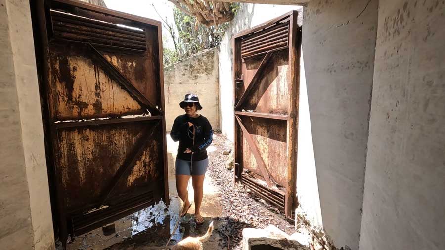 The author's wife with their puppy entering the bunker at Fort Segarra