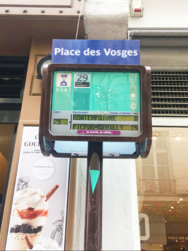 Bus stop signage at the Place des Vosges