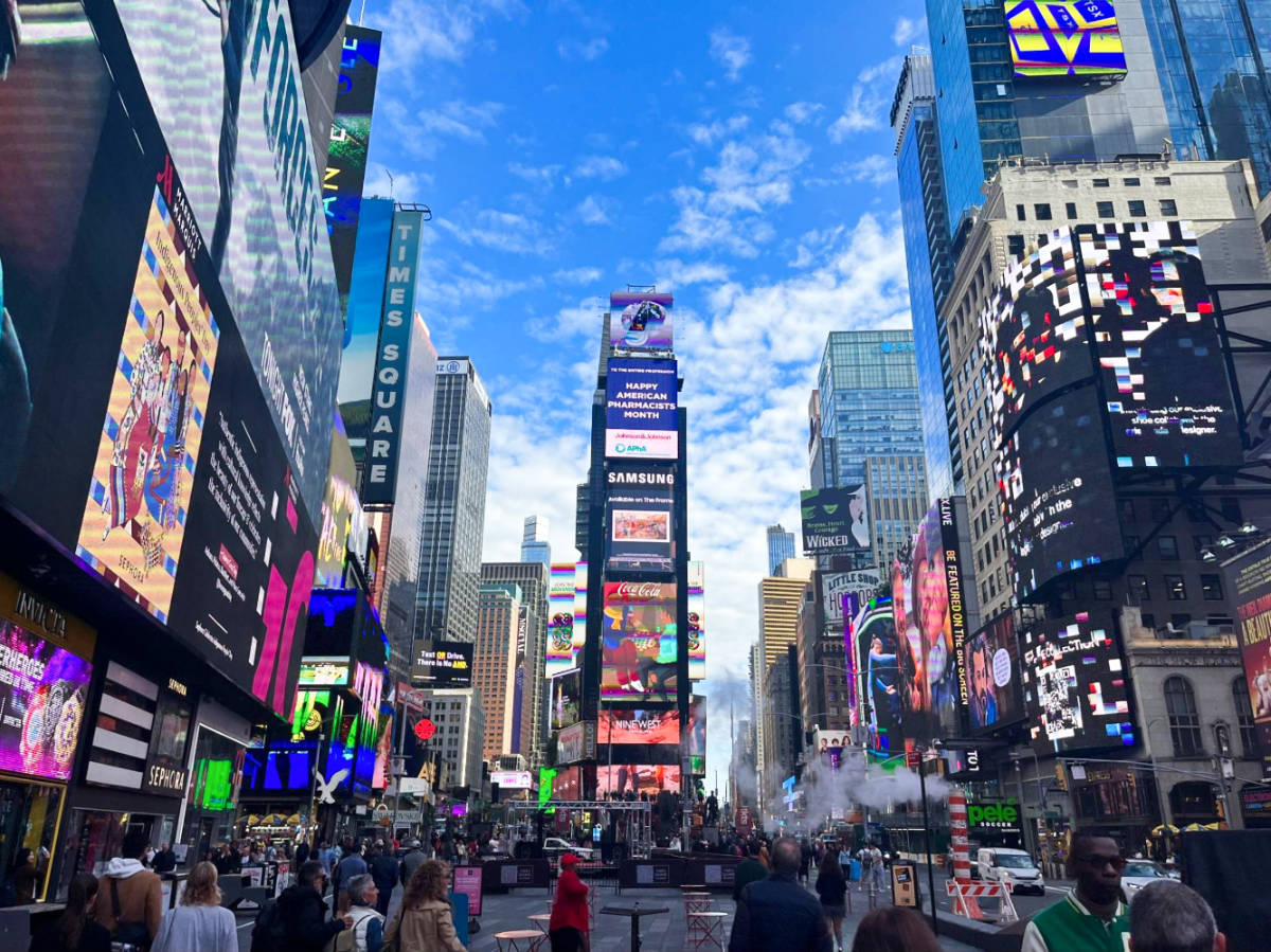 View of billboards and cars on the busy Time Square in Midtown Manhattan