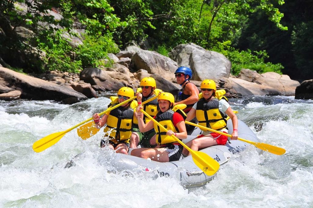 People riding a white water rafting on the Youghiogheny River