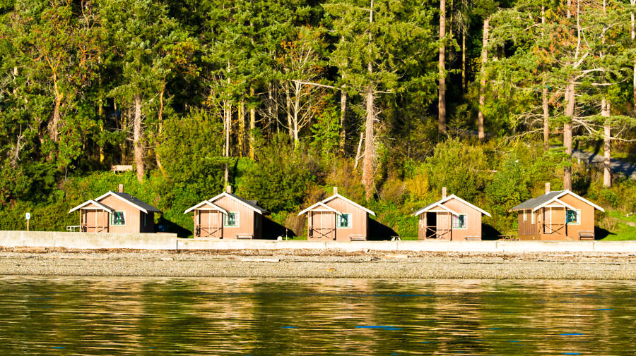 View of the cabins lined up at Cama Beach State Park