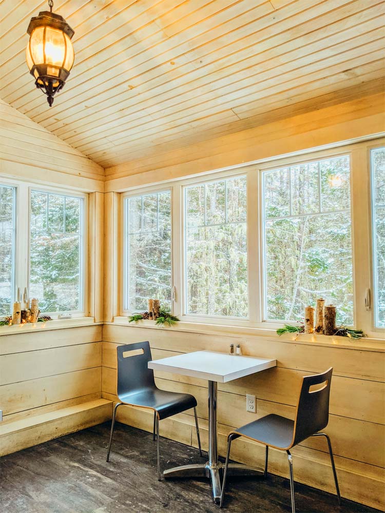 Table and chairs inside a cabin
