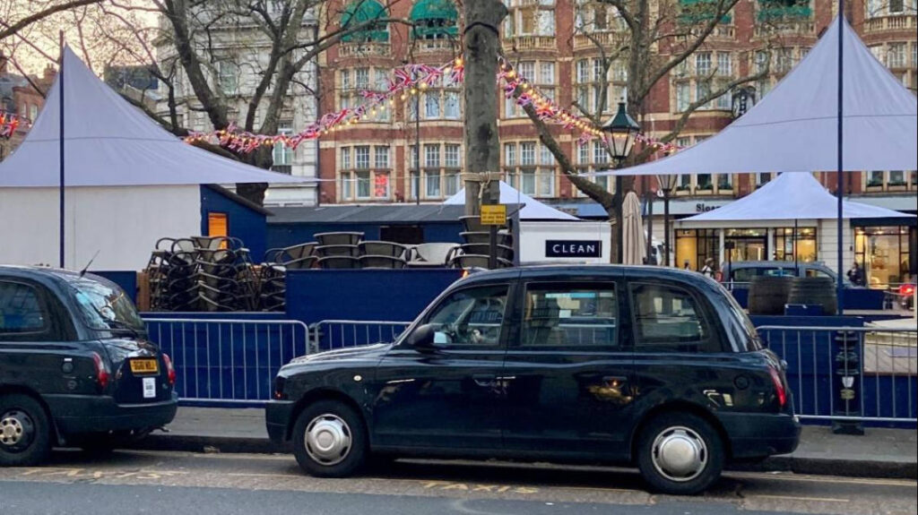 Black cabs parked at the Sloane Square