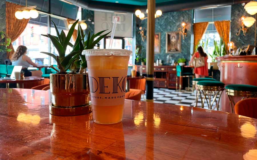 A cup of iced black currant tea with lemonade in Cafe Deko