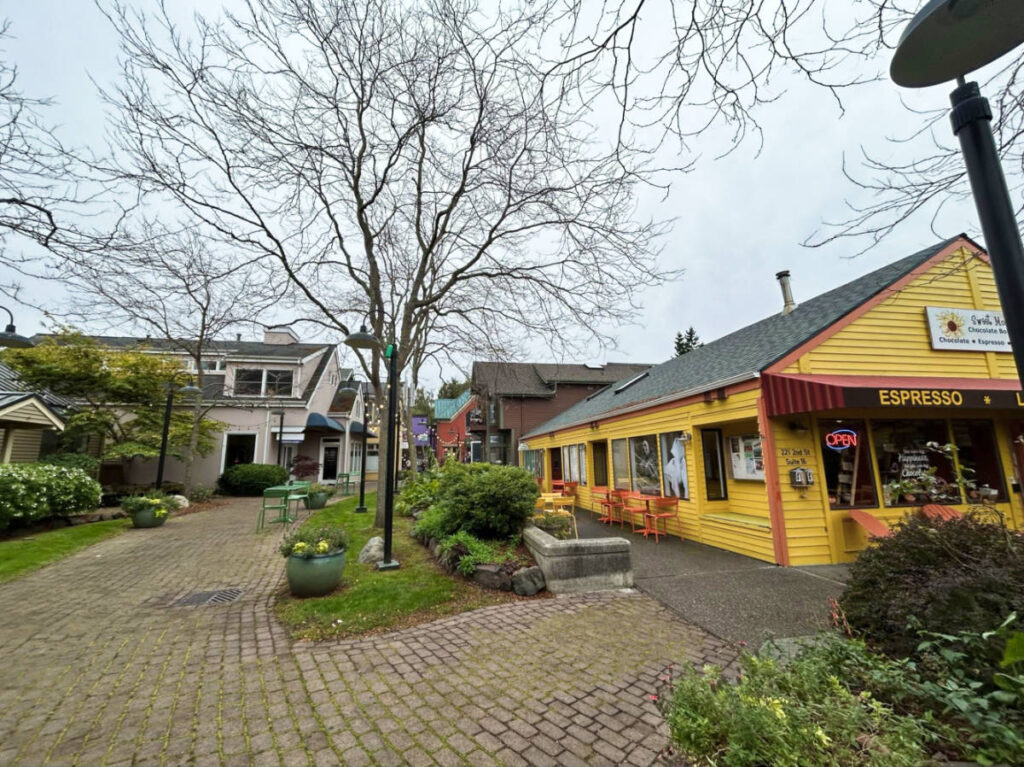 View of the shops and cafes at a cute courtyard in Langley