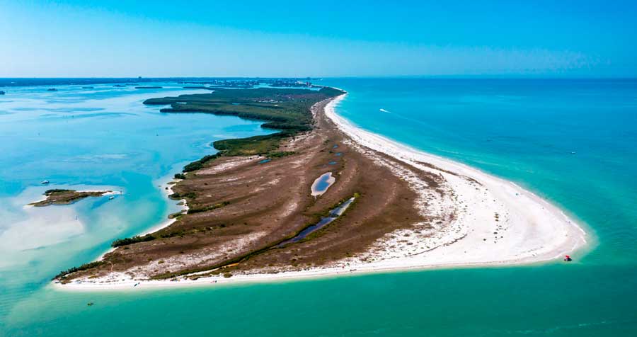 Aerial view of the Caladesi Island surrounded with blue green water