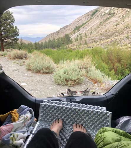 The author's view on her car trunk during her mountain road trip