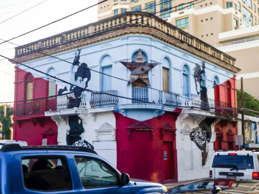 View of the mural on the exterior of the building of Calle Loíza