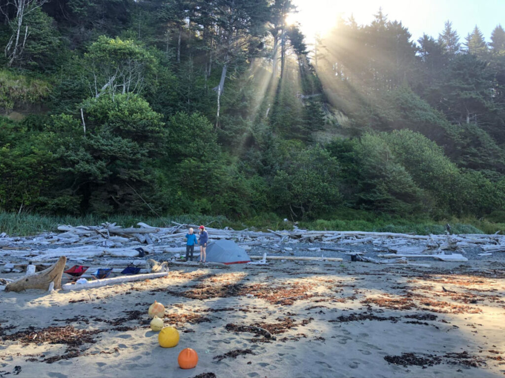 Campers with their tents on the beach