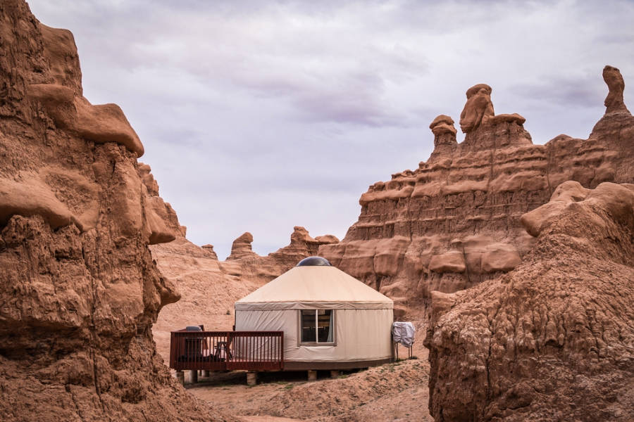 View of the camping yurt with a scenic view of the rock formations in the background in Goblin Valley