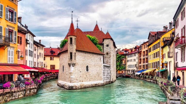 View of houses surrounded by a canal in Annecy
