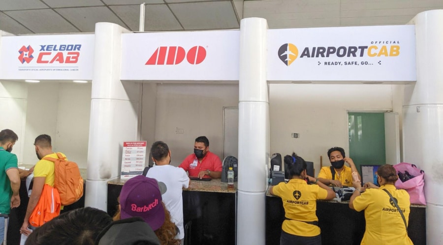 View of the booths of transportation alternatives in Cancun Airport