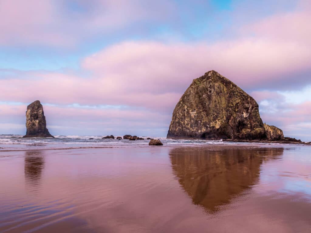 Colorful sky over Cannon Beach during sunrise