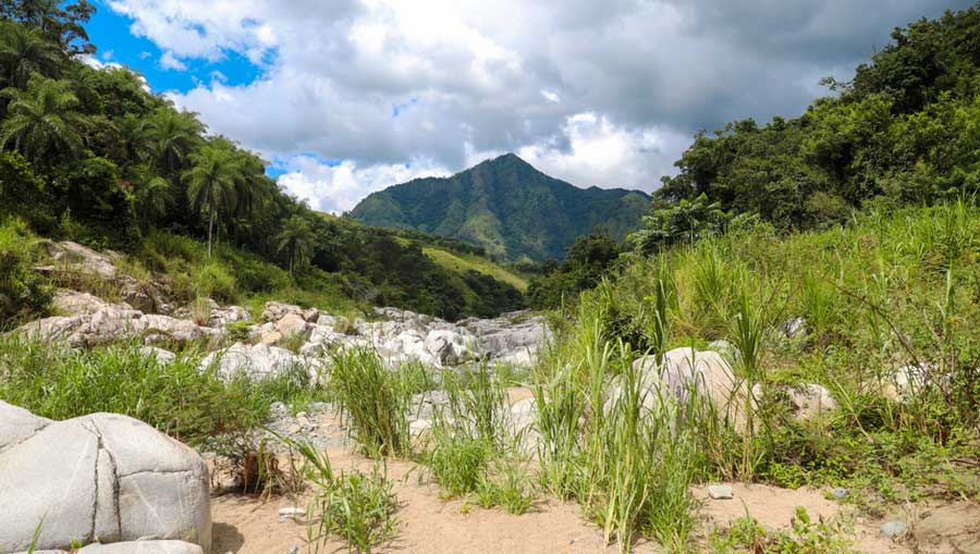 White rocks and a mountain from afar in Utuado
