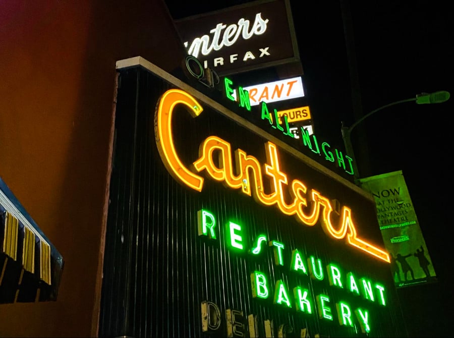 Exterior view of Canter’s Deli with yellow and green neon signage outside