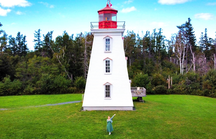 View of the author with the Cape Bear Lighthouse