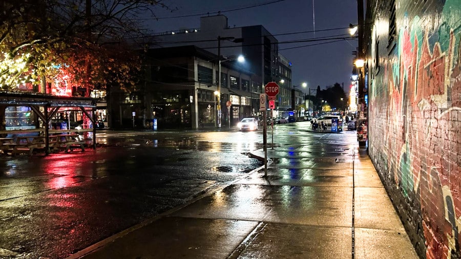 Illuminated street of Capitol Hill neighborhood on a rainy evening