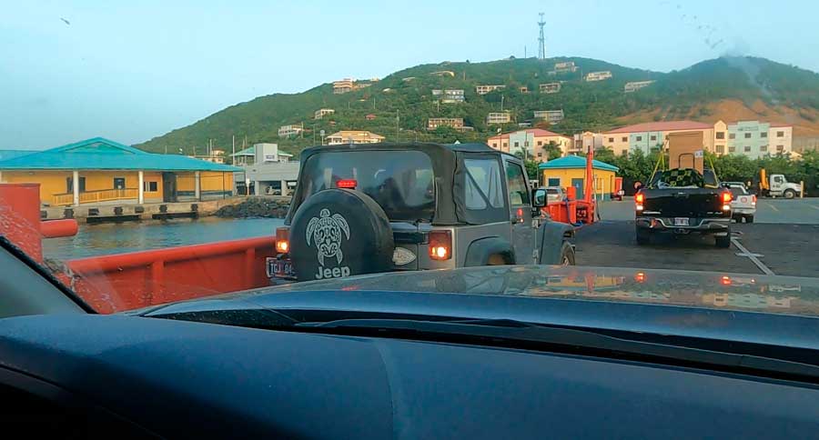 The author driving onto the car barge going to St. John