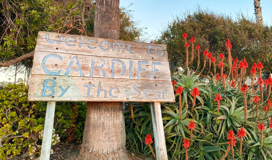 A beautiful landscape with hand painted wooden welcome sign of Cardiff by the Sea in Encinitas 
