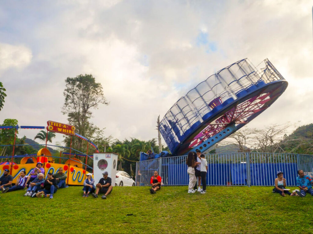 People resting after enjoying Carnival rides in Puerto Rico