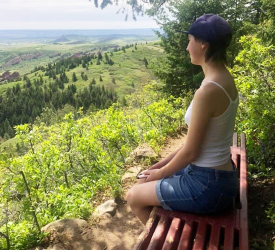 View of the author's daughter enjoying the scenery in Carpenter Peak
