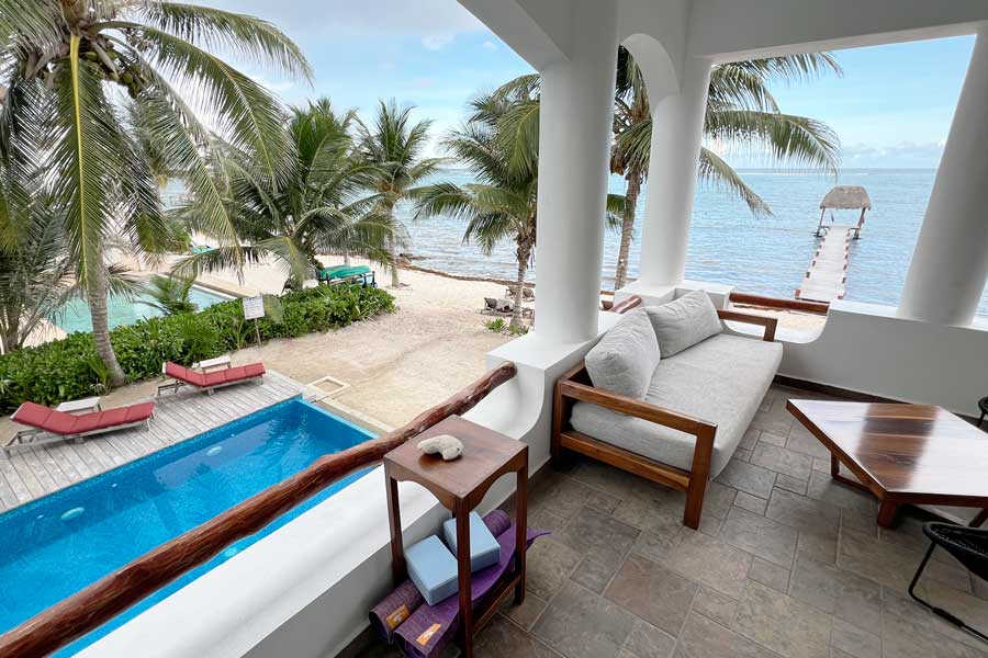 View of the beach and the pool from a balcony on Casa Altamar