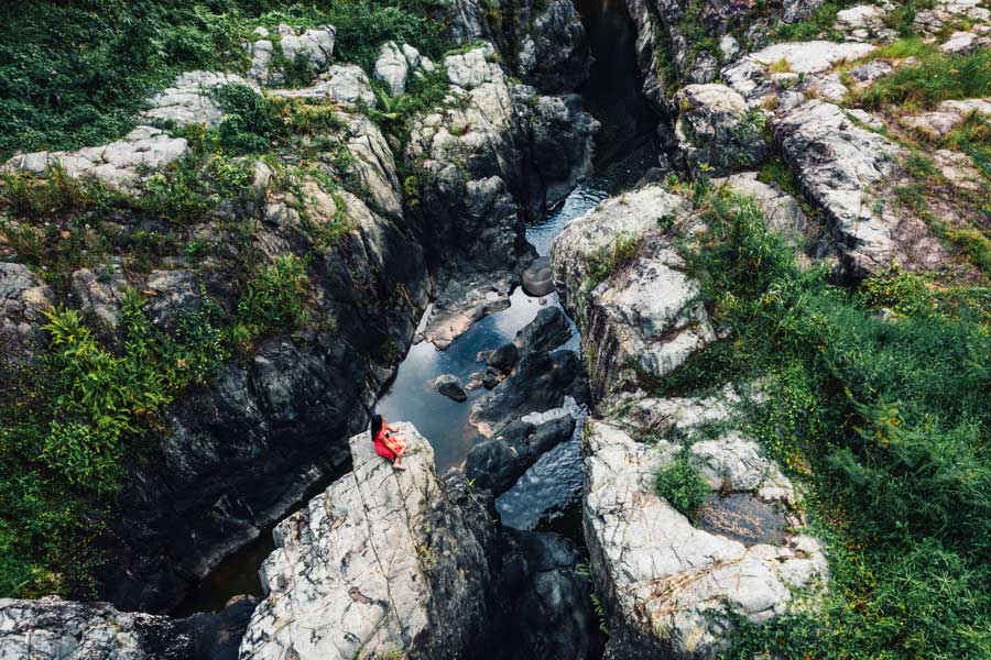 Aerial view of a woman admiring the view in Casa Grande Mountain Retreat