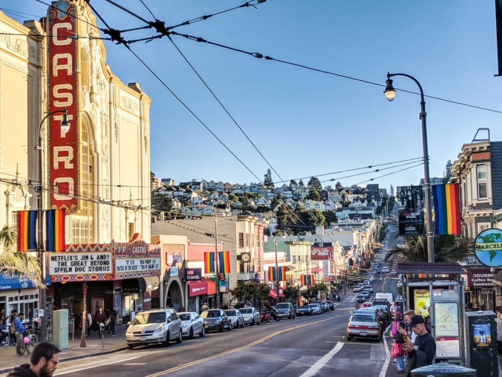 View of the Castro theater and the pride flags along the neighborhood