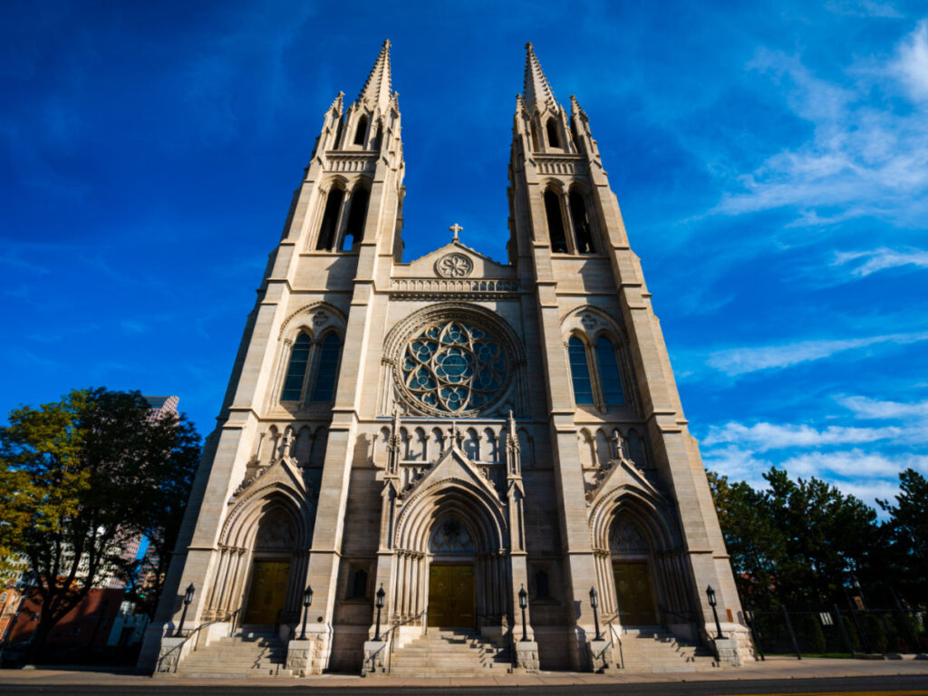 Front view of the Cathedral Basilica of the Immaculate Conception, Denver and blue sky in the background