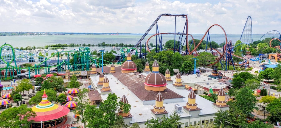 Aerial view of the lake and rides in Cedar Point Amusement Park
