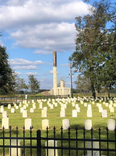 Tombstones at a cemetery in Carville