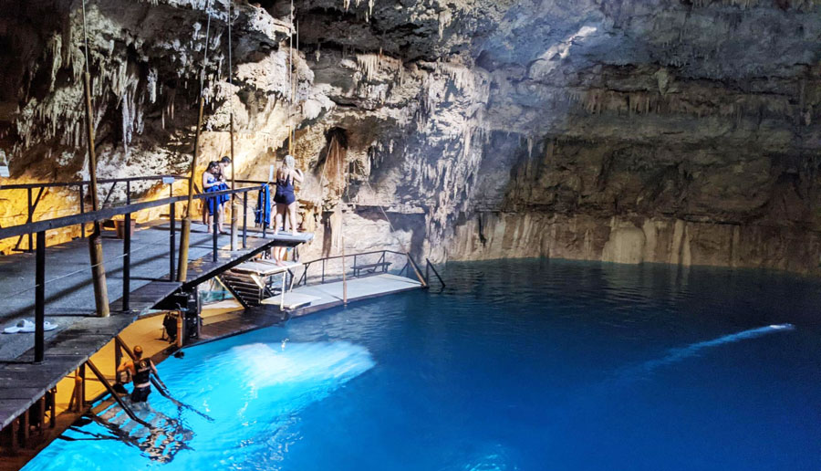 View of people preparing for a swim in Cenote Chukum