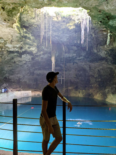 The author enjoying the peaceful view of Cenote Hubiku