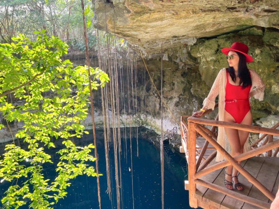 Clara in front of Cenote Secreto Maya