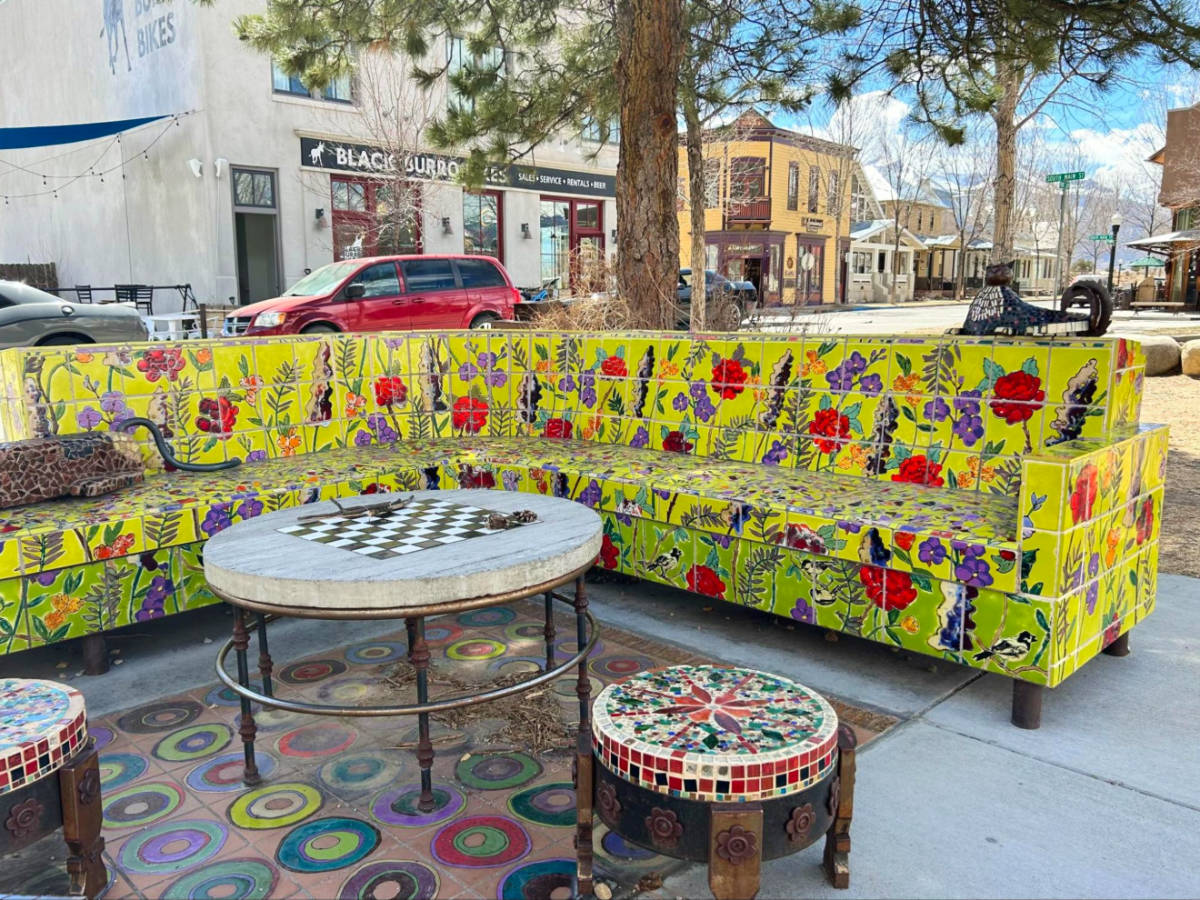 Colorful ceramic tile living room set on sidewalk in South Main
