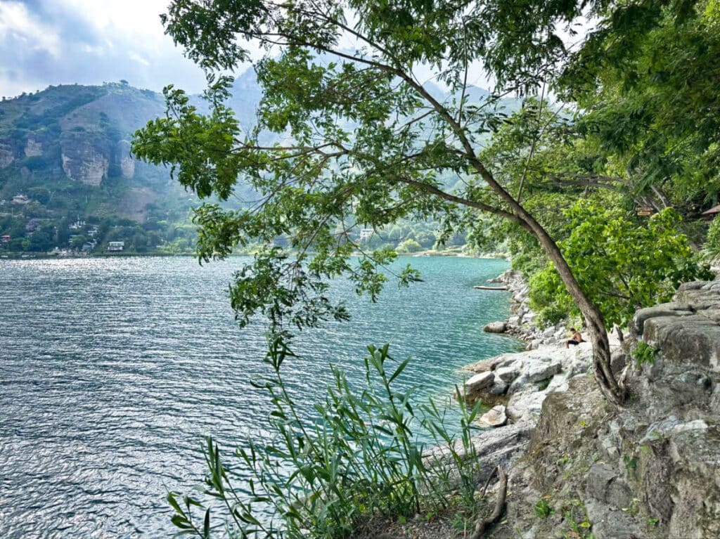 View of the swimming area surrounded by greenery at Cerro Tzankujil Nature Reserve in San Marcos