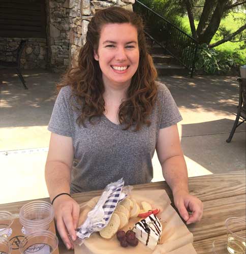The author enjoying her charcuterie plate at Arrington Vineyards