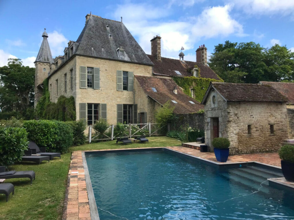 Château de Saint Paterne Swimming Pool featuring relaxing lawn chairs