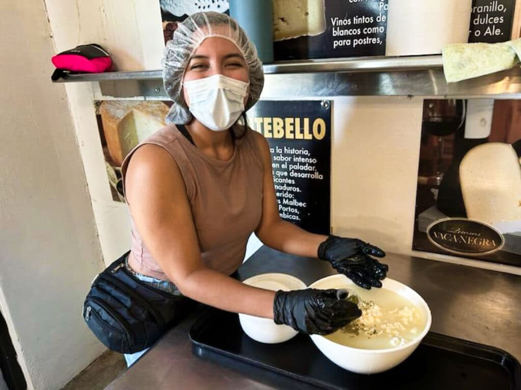 The author Vanessa Ramos, making cheese in Vaca Negra