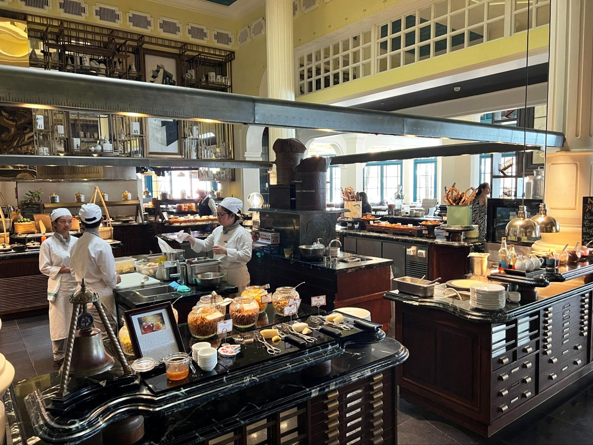 Chefs at the Tempus Fugit preparing foods for the hotel's guests
