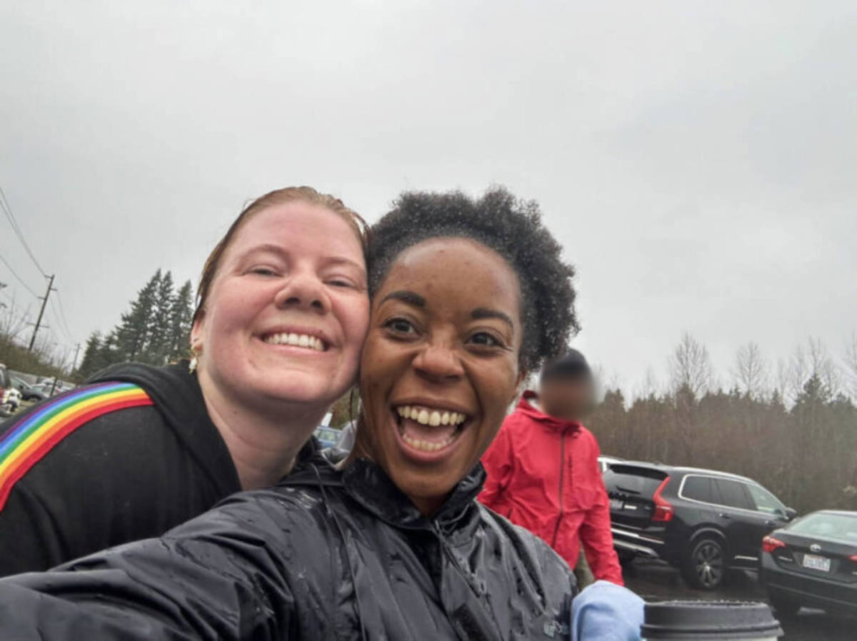 The author, Chelsea Booker with her friend during the rainy day race