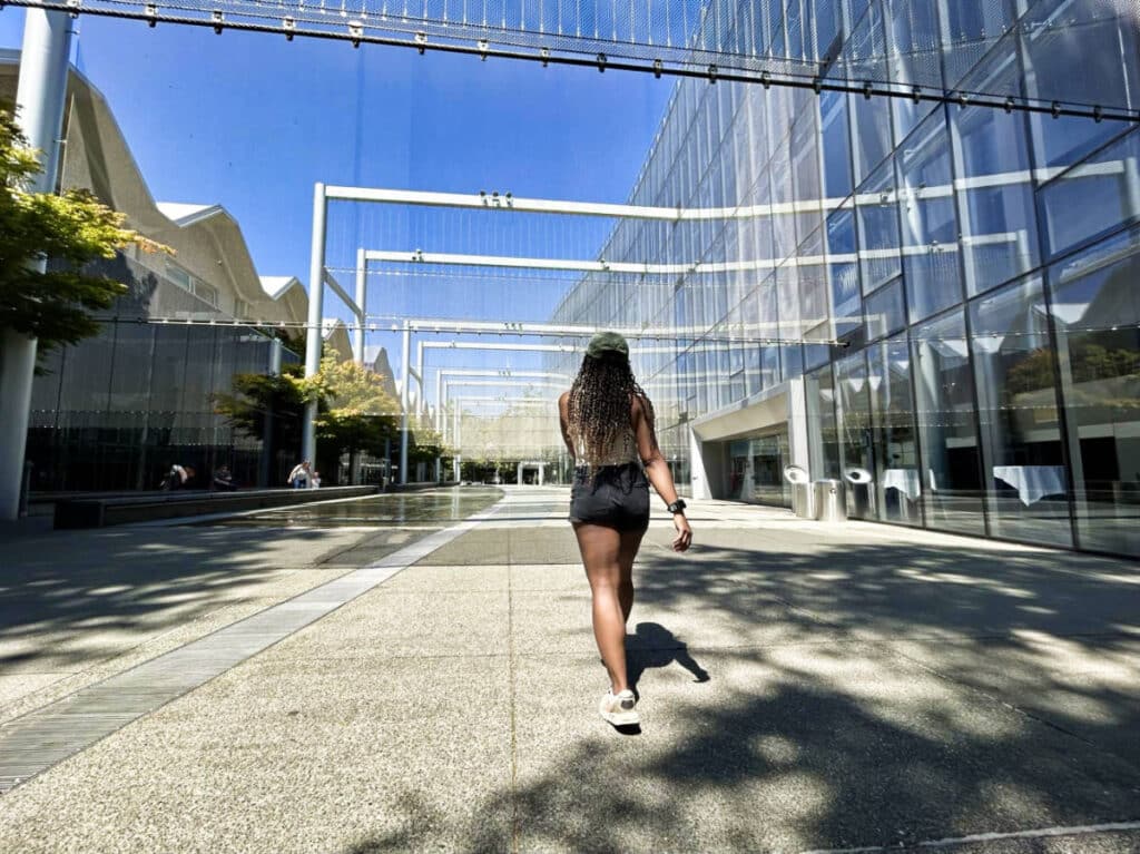 The author Chelsea Booker, walking outside McCaw Hall