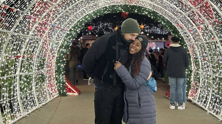 The author Chelsea and her husband enjoying at the Seattle Christmas Market
