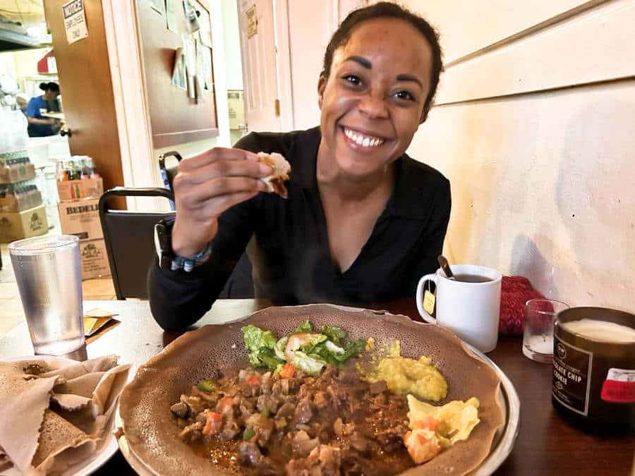 The author Chelsea Booker enjoying the meat combo at Cafe Salem