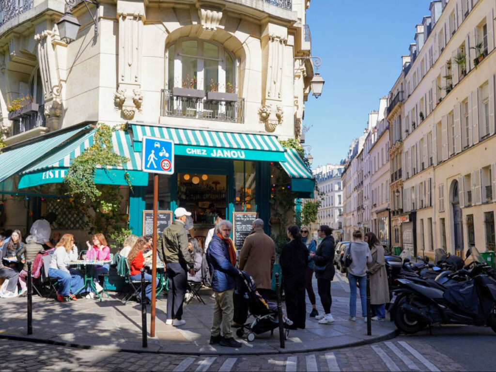 People dining outside Chez Janou in the Marais