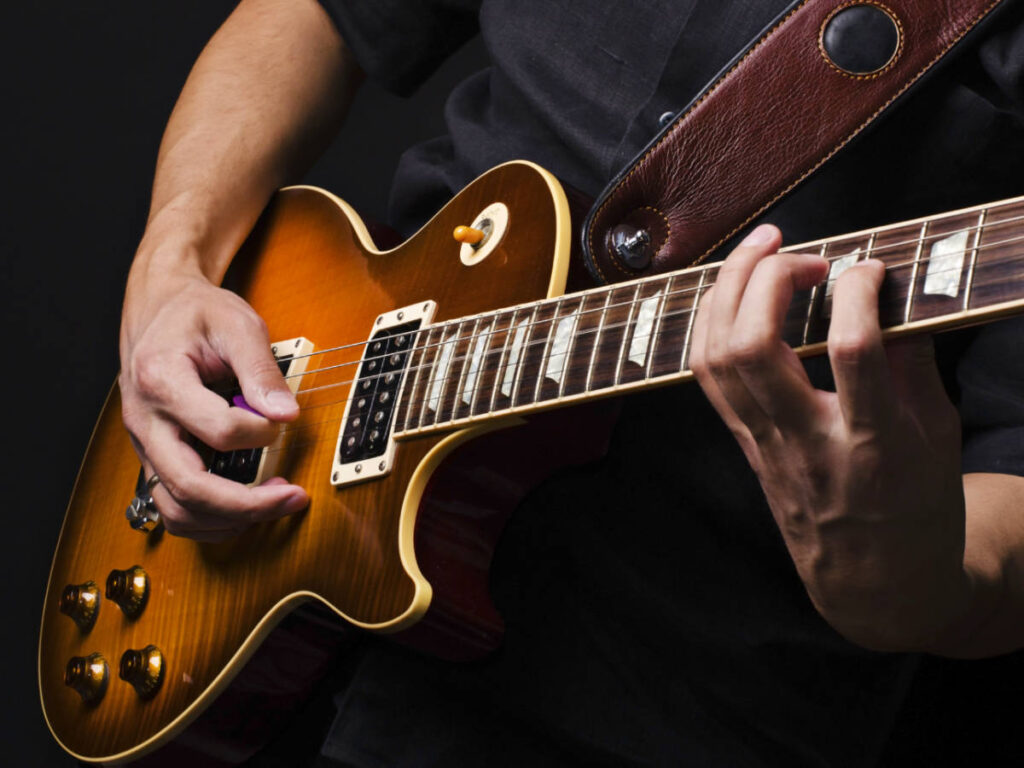 Man playing a guitar